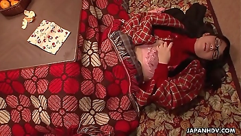 nerdy-asian-teen-rubs-her-cunt-under-the-blanket