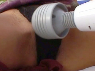 Japanese milf with big tits slips finger into her tight wet pussy