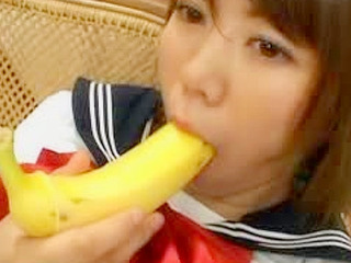 Thai schoolgirl fucks her pussy with a banana while on vacation in Tokyo